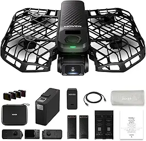 HOVERAir X1 PRO self-flying drone autonomously following a snowboarder down a powder-covered mountain run, capturing smooth 4K cinematic aerial footage